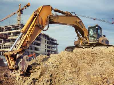 Excavator at construction site - low-angle view