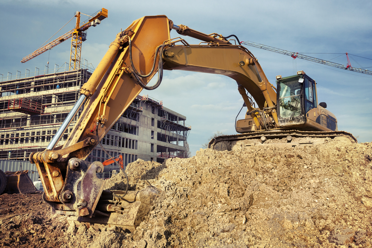 Excavator at construction site - low-angle view
